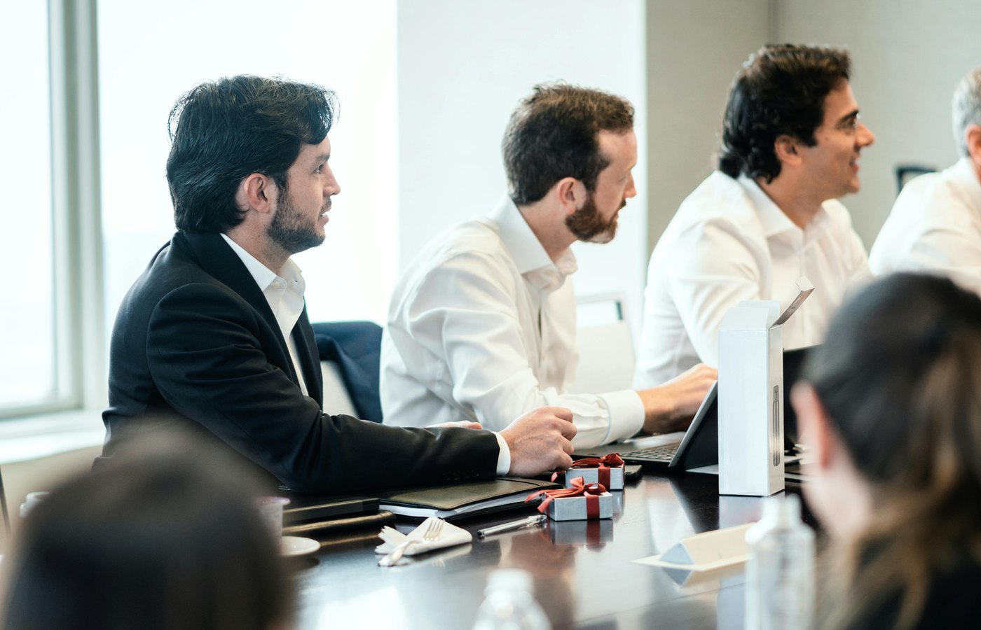 Professionals listening during a business meeting