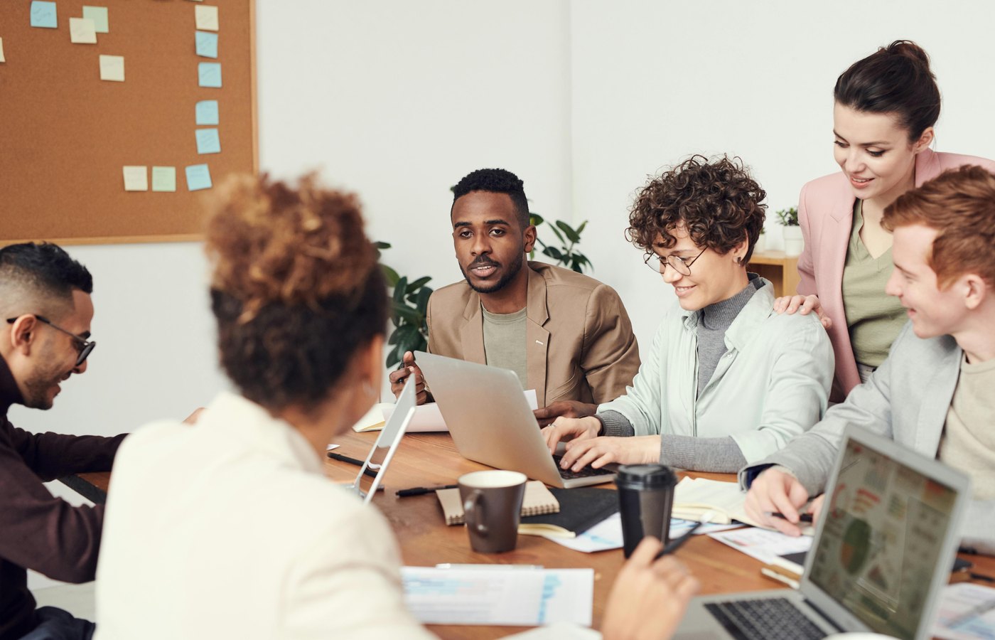 Team collaborating around a meeting table